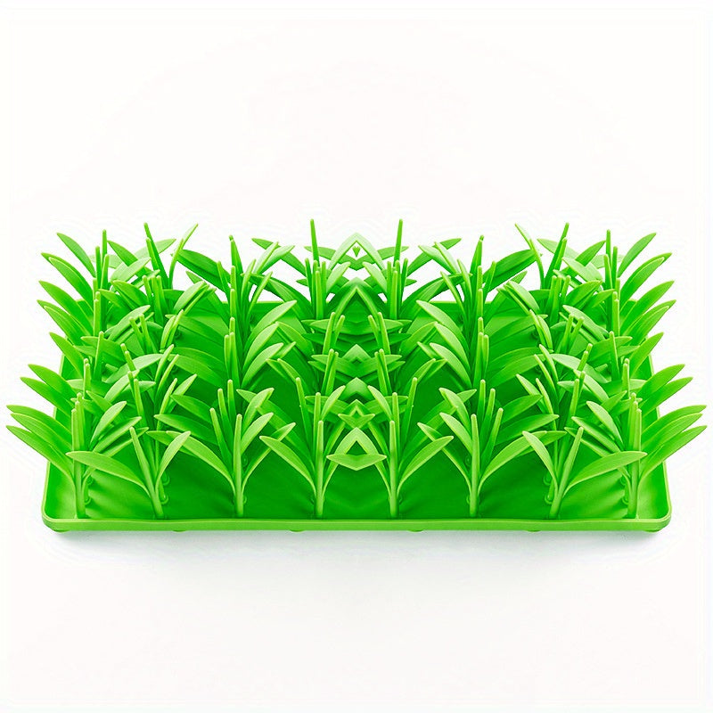 Green plastic grass mat on a white background