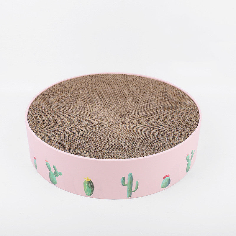 Round pink cat scratcher with cactus design on a white background