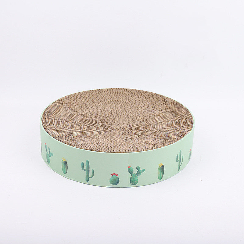 Round cardboard cat scratcher with cactus design on a light green base