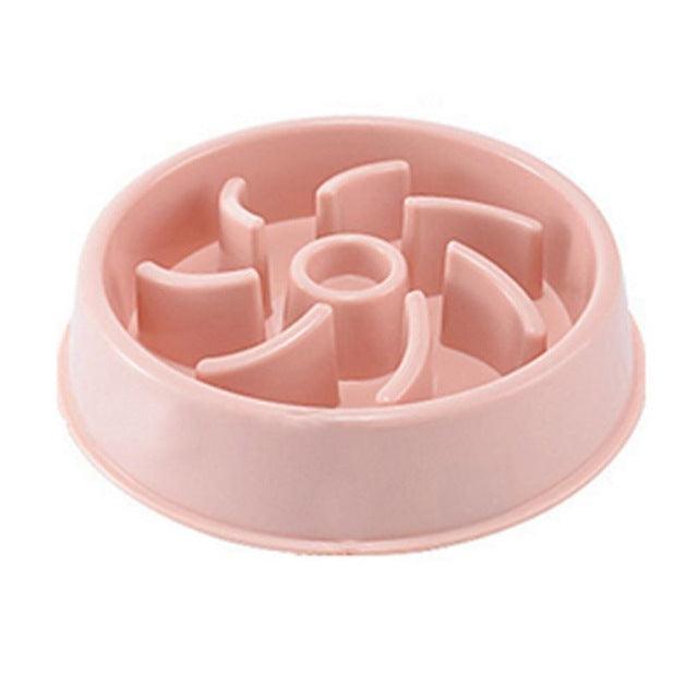 Pink pet slow feeder bowl on a white background