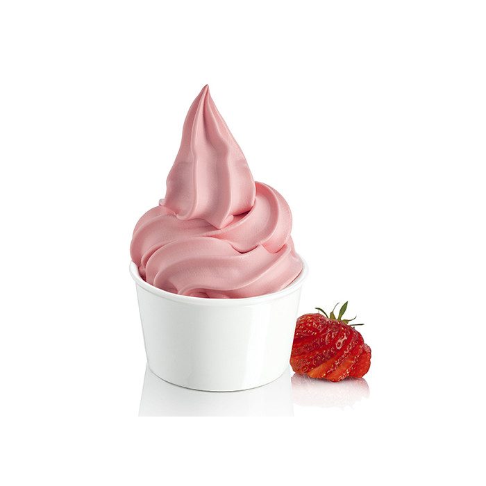 Pink soft serve ice cream in a white cup with a strawberry on a white background